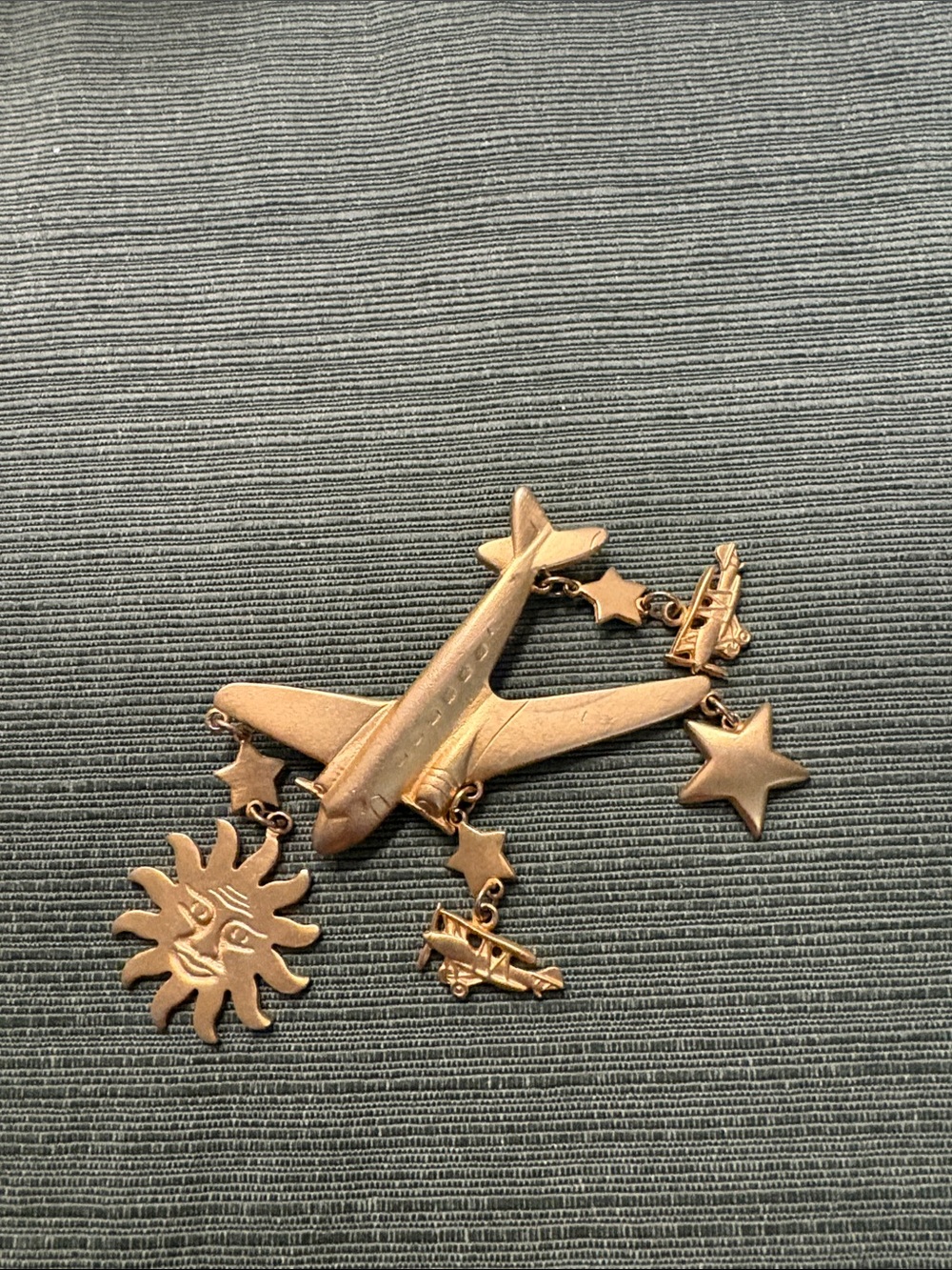 Gold-tone Airplane Charm Brooch with Stars and Sun